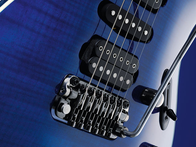 The SV5470F's bridge is a double-locking job that uses ball-bearings to pivot rather than a knife edge design